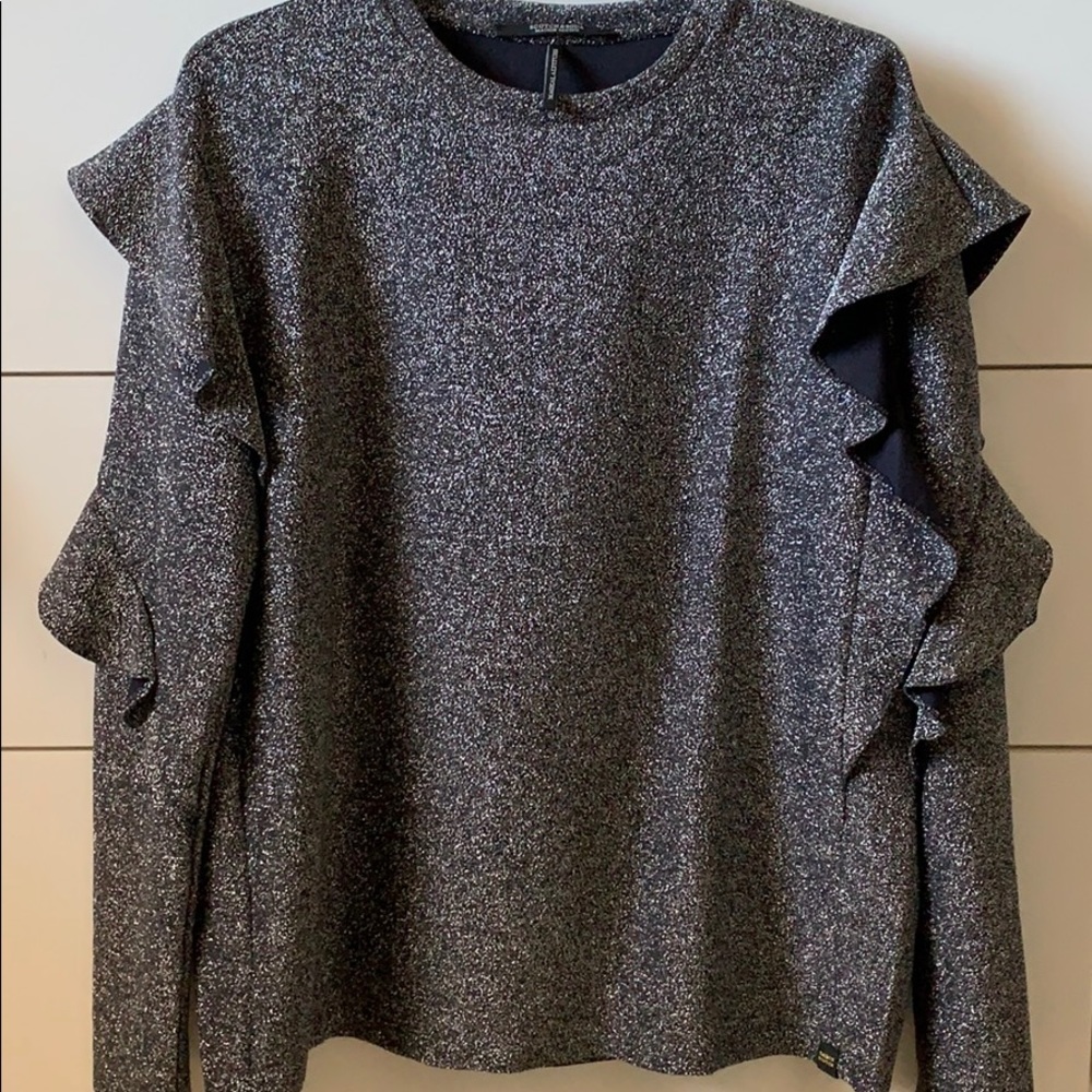 A Light Shimmery Sweater Top